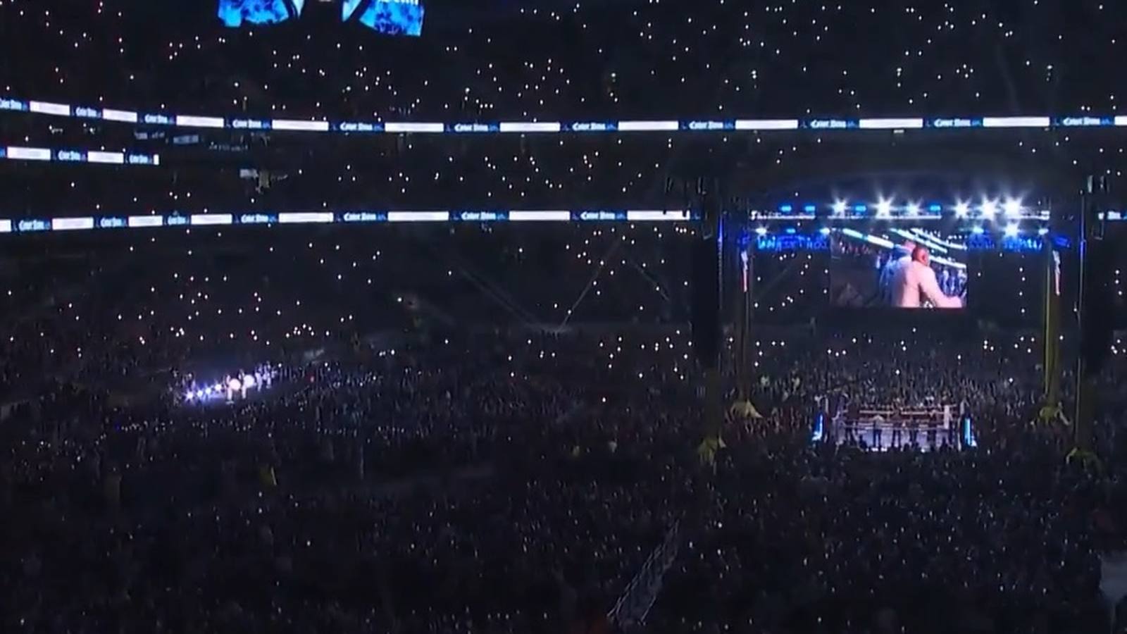 The stadium in the dark, lights across the whole bowl.
